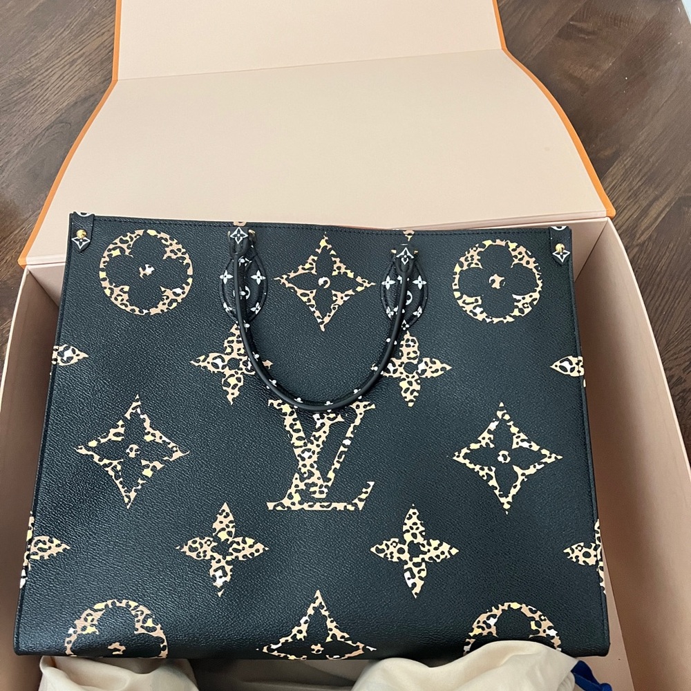 Louis Vuitton On The Go GM Jungle Tote. New never carried.